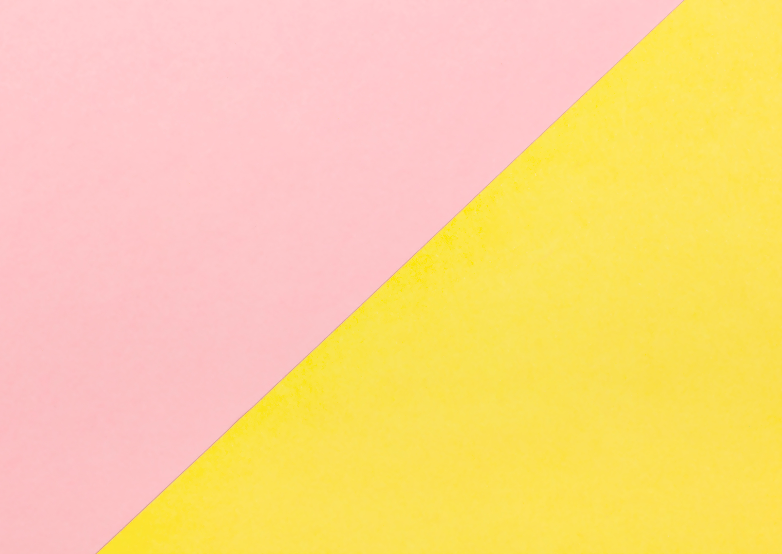 Pastel Pink and Yellow Split Diagonal Background